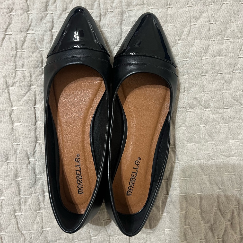 Marbella Black Flats with patented leather tip. Size 6.
